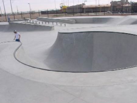 2. The skateboarder carving the bowl